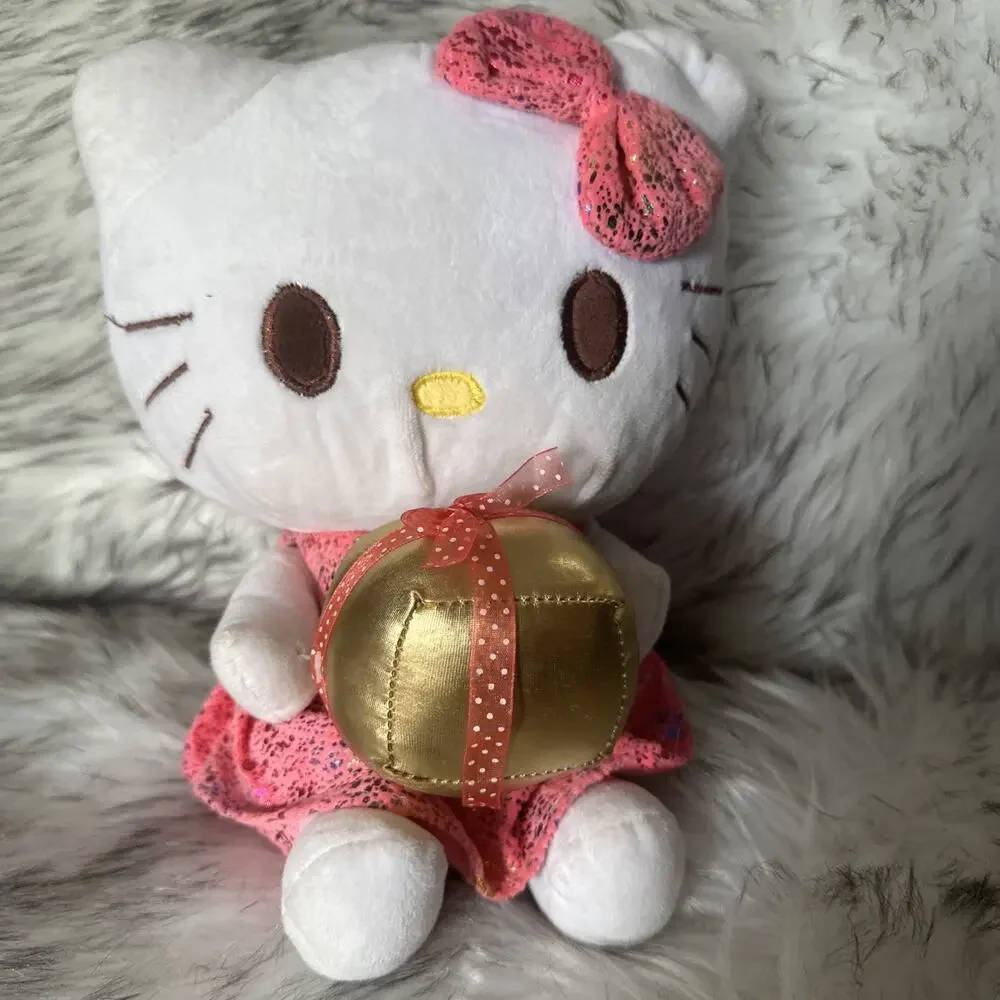 Hello Kitty Plush Pink Dress Holding A Present
